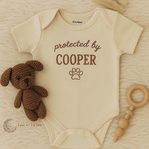 Embroidered  "Protected By Dog" Baby Onesie ®, Pregnancy Announcement,Naturel Onesies ® For Baby Gril and Boy ,Hospital Outfit.