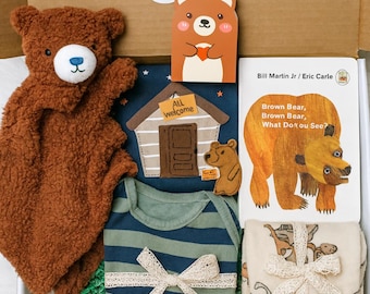 Caja de regalo para baby shower de niño: mono, manta, osito de peluche y libro.