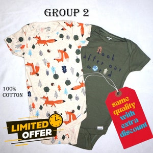 May include: Two baby onesies, one with a fox print and the other with the text "Look after our world". Both onesies are white with green trim and have a tag that says "Same quality with extra discount".