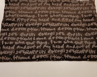 Brown Velvety Words Fabric Remnant