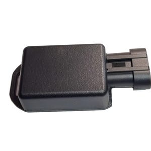 May include: A black rectangular electronic component with a connector on the side.