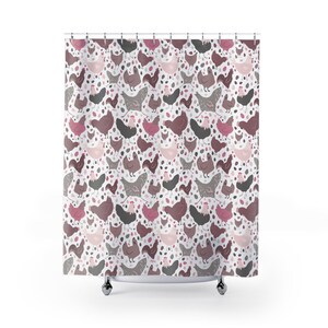 May include: A white shower curtain with a repeating pattern of chickens and eggs in shades of pink, gray, and brown. The chickens are in various poses, and the eggs are scattered throughout the design.