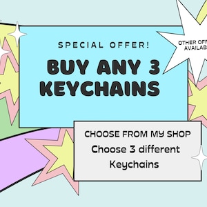 Könnte beinhalten: Eine blaue und weiße Grafik mit einem Regenbogenhintergrund und Sternen. Der Text lautet "SONDERANGEBOT! KAUFE 3 BELIEBIGE SCHLÜSSELANHÄNGER WÄHLE AUS MEINEM SHOP Wähle 3 verschiedene Schlüsselanhänger ANDERE ANGEBOTE VERFÜGBAR".