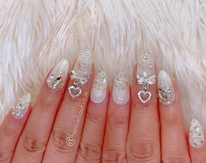 Butterflies and bow ties | Sparkly stones and pearls | Rhinestone Nail Art | press on nails