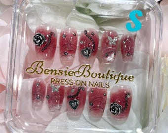 XHS Edgy: Black Charms and Red Aura Nails