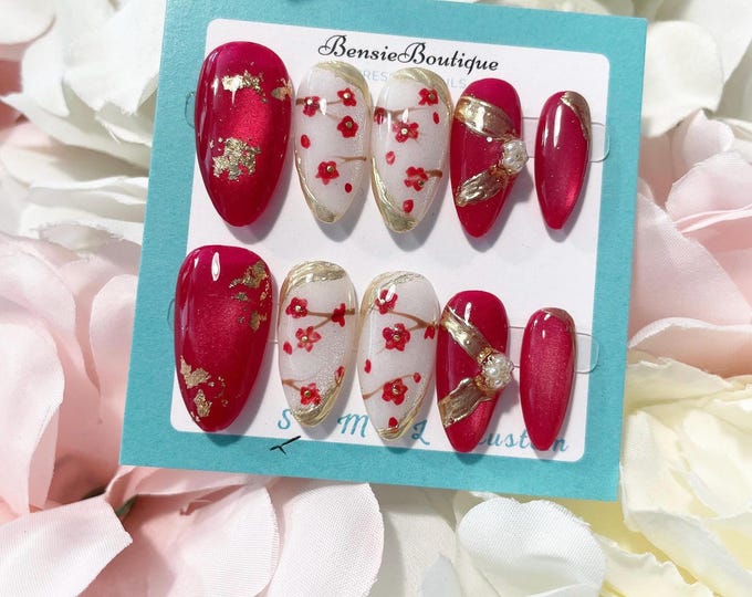Berry Red and Cherry Blossom Cat Eye Nails with Gold Chrome detailing