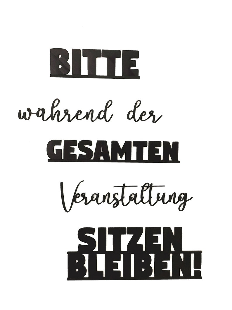 May include: Black and white sign with the text "Bitte w&auml;hrend der gesamten Veranstaltung sitzen bleiben!" which translates to "Please remain seated throughout the entire event!"
