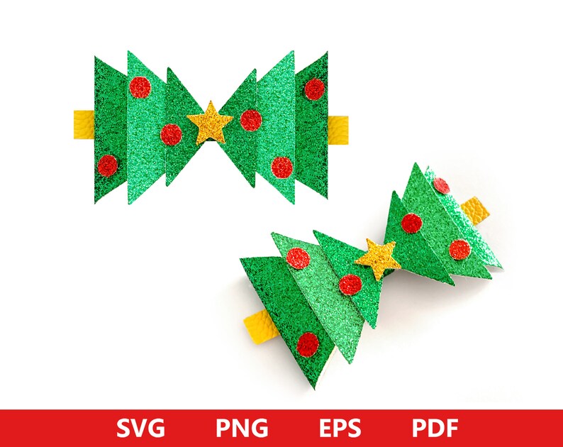 May include: Two green glitter Christmas tree decorations with red and yellow accents. The decorations are shaped like a bow and a single tree.