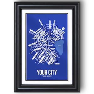 May include: Framed city map art print with a blue background and white street names. The map includes the text "YOUR CITY" and "YOUR STATE". The black frame adds a classic touch to the artwork.