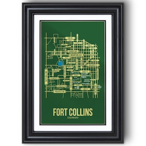 May include: A framed print featuring a map of Fort Collins, Colorado. The map is in gold on a dark green background, with street names and a blue water feature. The frame is black.