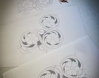 May include: Three printable leather carving patterns featuring a floral design with three flowers and leaves.