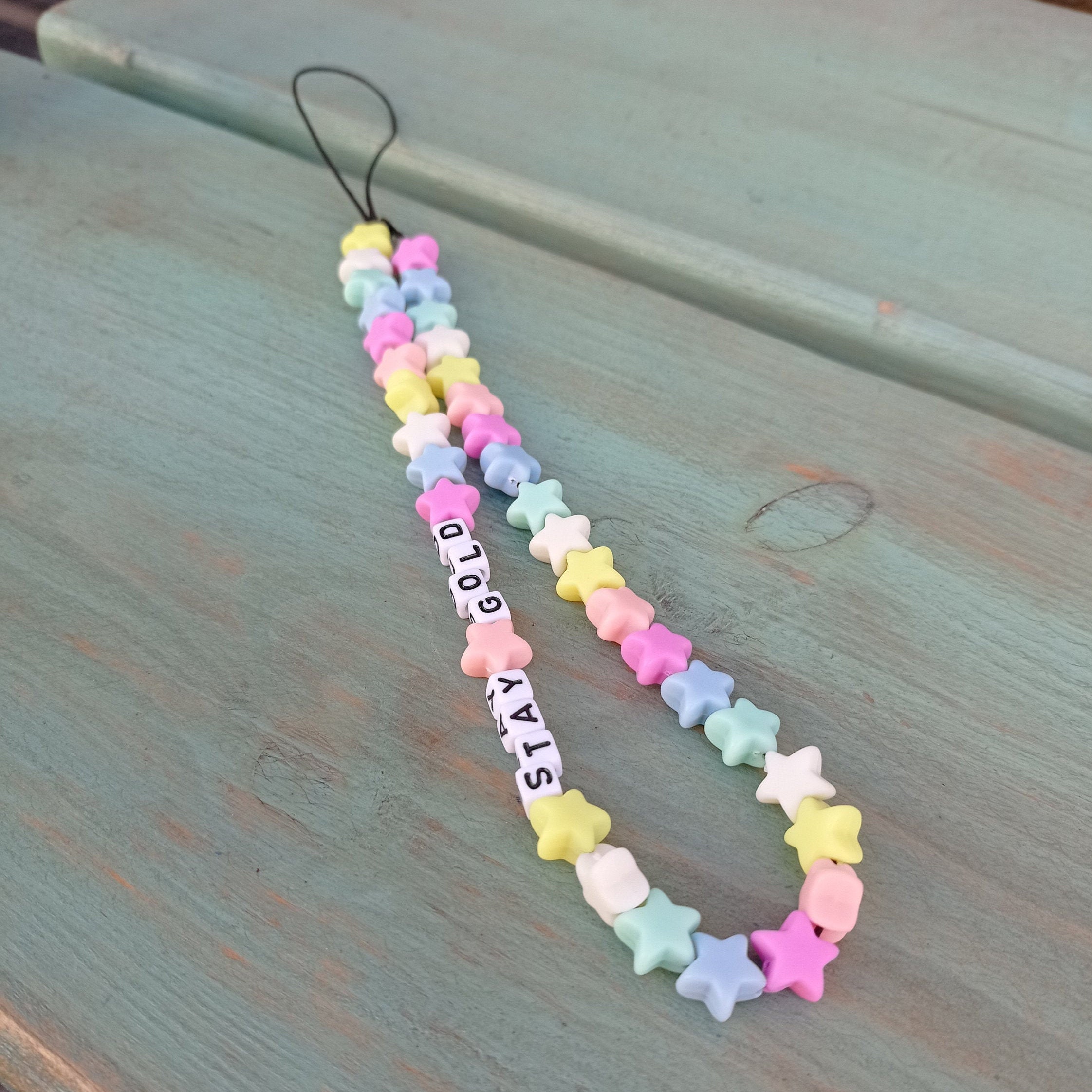 Candy chain phone/phone strap beads | Etsy How To Make A Beaded Phone Strap