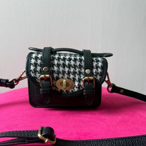 Mini black leather and black/white houndtooth pattern Harris Tweed handbag with shoulder strap