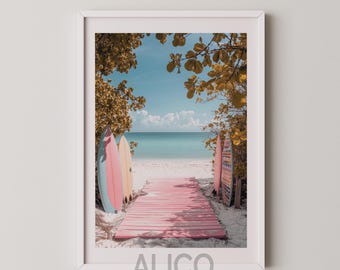 May include: Three colourful surfboards leaning against a wooden walkway leading to a beach with blue water and a bright sky. The surfboards are pink, blue, and yellow. The walkway is made of light pink wood.