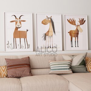 May include: Three framed illustrations of animals, a goat, a horse, and a moose, with a white background. The frames are white and the illustrations are in a cartoon style with brown and white colors.
