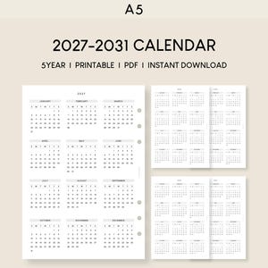 May include: A5-sized printable calendar spanning from 2027 to 2031. The calendar features a minimalist design with a white background and black text. The text includes the years, months, and days of the week. The calendar is a PDF and available for instant download.