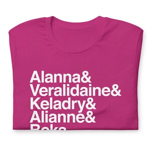 pink variety of tamara pierce custom shirt with white helvetica text, left aligned, listing vertically characters names from top to bottom: allana &, veralidiane &, keladry &, alianna &, beka