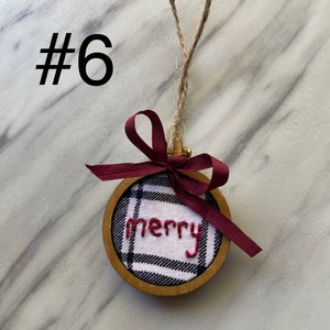 Handgesticktes Ornament-Merry