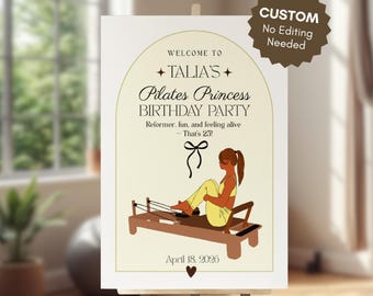 Puede incluir: Un letrero personalizado de fiesta de cumpleaños de Pilates Princess en un caballete. El letrero presenta el texto "Welcome to Talia's Pilates Princess Birthday Party" con una ilustración de una persona en un reformer. También incluye la fecha 18 de abril de 2026.