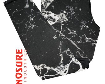 May include: Black leggings with a white marble pattern. The leggings have a black waistband and a white logo that says "CYNOSURE INDUSTRIES".