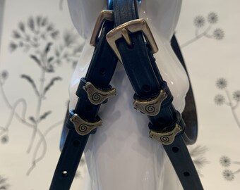 Black English leather spur straps with brass hardware