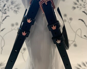 Black English leather spur straps with rose gold buckles and rose gold crowns