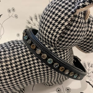 Black leather dog collar with chrome hardware and crystals