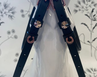 Black English leather spur straps with rose gold buckles and rose gold horse shoes