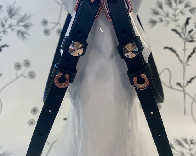 Black English leather spur straps with rose gold buckles and rose gold horse shoes