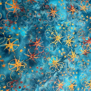 May include: A fabric featuring a mottled teal and blue background with a repeating pattern of orange and yellow star-like shapes and circular outlines. The design includes various sizes of these geometric forms scattered across the surface.