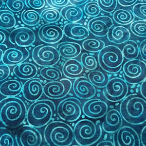May include: Close-up of a fabric with a repeating spiral pattern. The fabric features a dark blue background with lighter teal spirals and small dots. The design creates a textured, swirling effect, suitable for various craft projects.