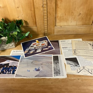 Vintage Lot Of 9 Nasa Papers | US Space Shuttle Glider Kit | Set Of 4 Photos | Set Of 2 Nasa Fact Booklets | The Shuttle Era
