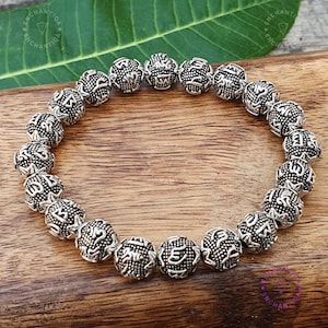 Tibetan Om Mani Padme Hum Bracelet: Carved Silver-Plated Copper Beads