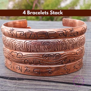 Handgefertigtes Armband Set aus Kupfer: Om Mani Padme Hum, Acht Glückssymbole