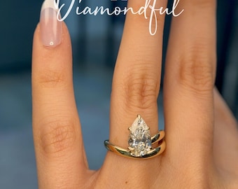 Pear Cut Spiral Solitaire Engagement Ring with Curved Bypass Band 14K Gold