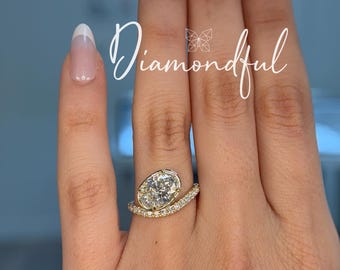 East-West Assymetrical Bypass Oval Cut Bezel Engagement Ring with Pave Diamond Band 14K Gold