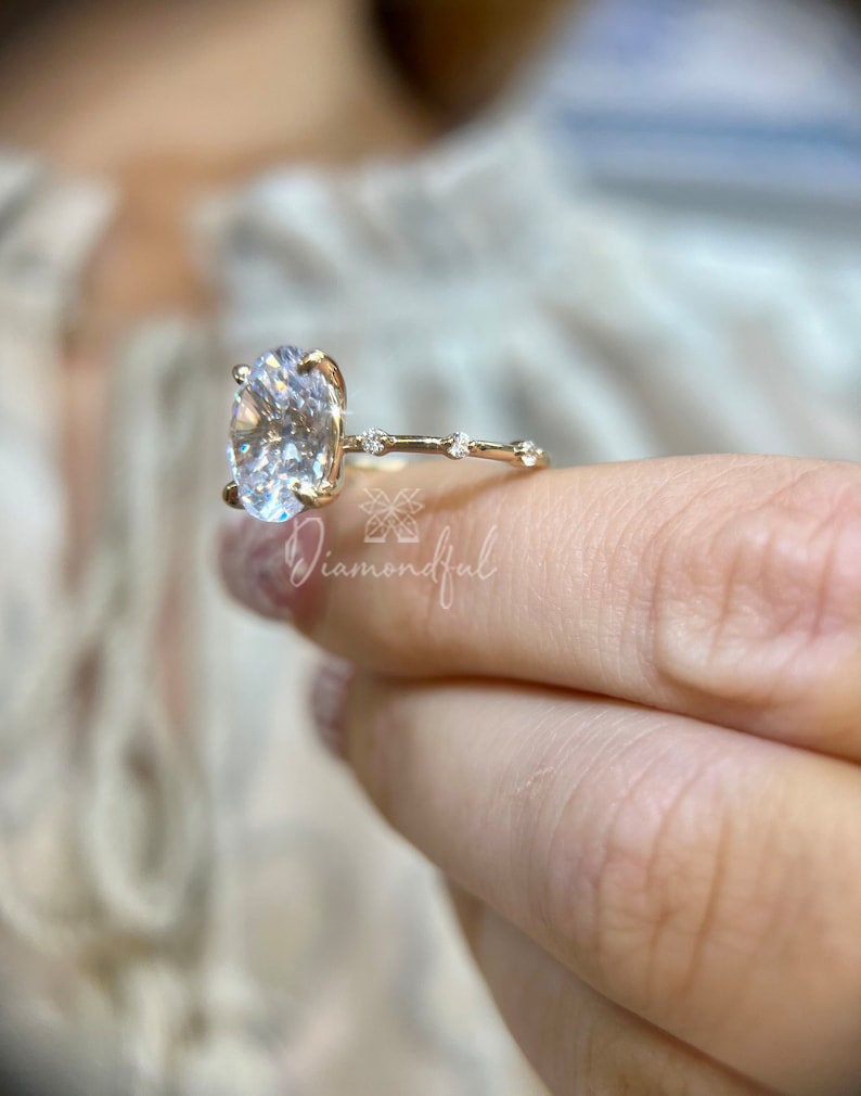 Floating oval engagement best sale ring
