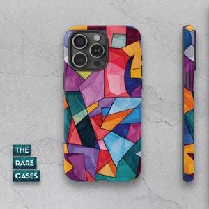 May include: A colorful abstract geometric pattern phone case with a black camera cutout. The case is made of a hard plastic material and has a glossy finish.
