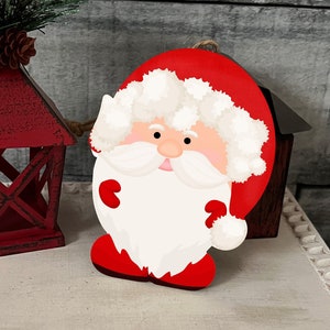 Santa Claus or Mrs. Santa Claus Elf Shaped Hardboard Ornament