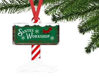 Santas Workshop Sleigh North Pole Snowflakes Winter Sign Shaped Hardboard Ornament