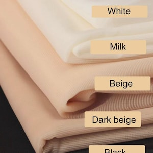 May include: A stack of fabric samples in various neutral colors. The colors include white, milk, beige, dark beige, and black. Each color is labeled with a corresponding text label.