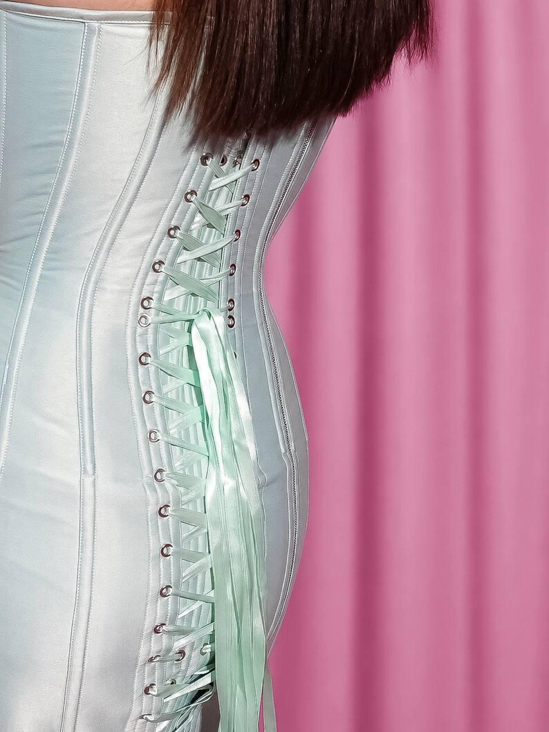 Back view of satin corset dress with full lace-up closure and separating zipper