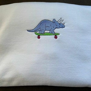 Dino On Skateboard Embroidered Crewneck