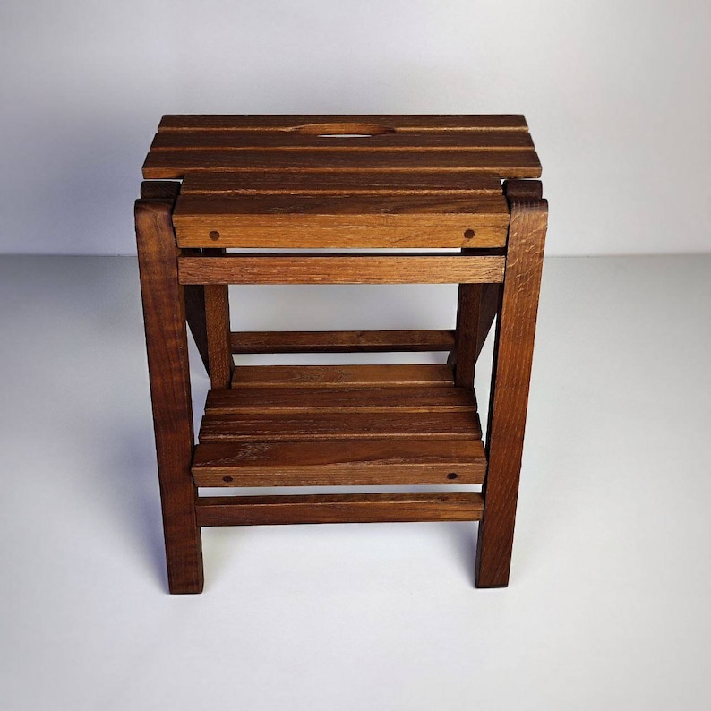 foldable step stool, wooden step stool, folding ladder, folding helper tower, kitchen step stool, library step stool, wood step ladder, 
2-Step ladder, bathroom step stool, hallway step stool, toddler tower, folding bench, step stool adult,