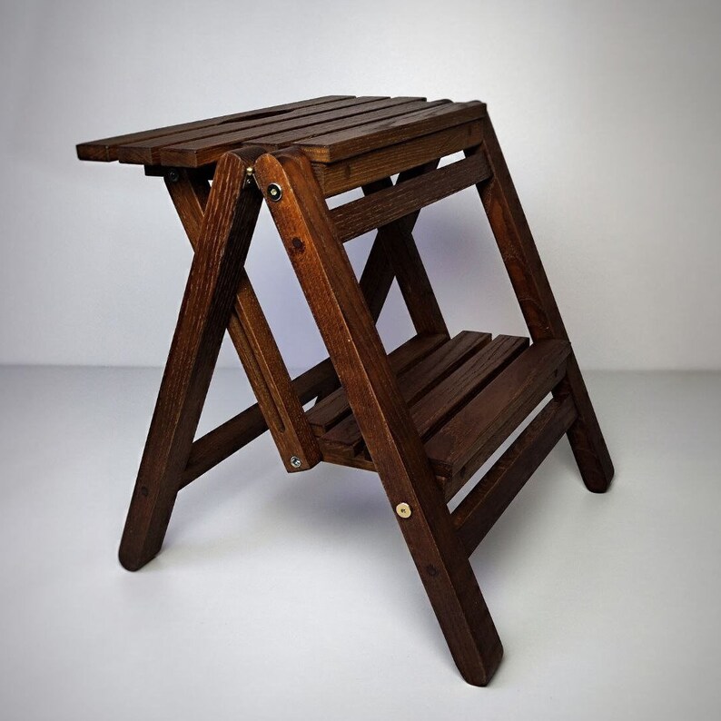 foldable step stool, wooden step stool, folding ladder, folding helper tower, kitchen step stool, library step stool, wood step ladder, 
2-Step ladder, bathroom step stool, hallway step stool, toddler tower, folding bench, step stool adult,