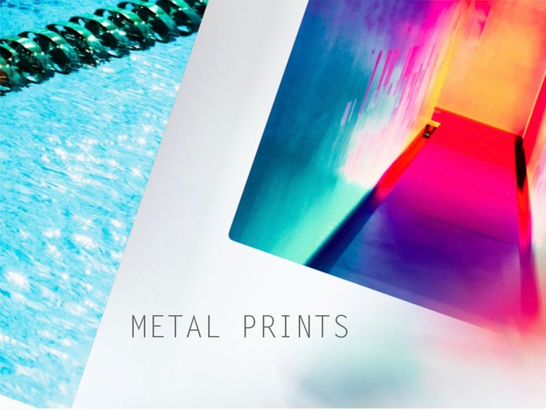 May include: A close-up of a colorful abstract metal print with a blue, green, pink, and orange color scheme. The text "METAL PRINTS" is visible at the bottom of the image.