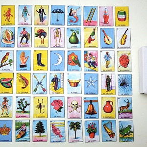 May include: A set of 54 colorful cards featuring various images, including a rooster, a watermelon, a boot, a moon, a shrimp, a cactus, a rose, a skull, a bell, and a deer. The cards are labeled in Spanish with the name of each image. The cards are arranged in a grid on a white surface. The text on the box reads "Mini cartes de loterie mexicaine. Jeu complet (54 cartes)"