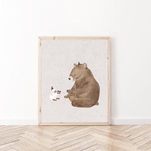May include: A brown bear wearing a party hat sits on a white background and looks at a white bird wearing a party hat holding a small gift box.