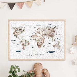 May include: A watercolor world map with illustrations of animals from different continents. The map is framed in a light wood frame and has a white background. The map includes the names of the oceans and continents.