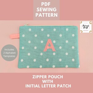May include: PDF sewing pattern for a zipper pouch with an initial letter patch. The pouch is teal with white polka dots and features a pink felt letter "A".